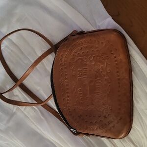 A leather purse from costa rica
